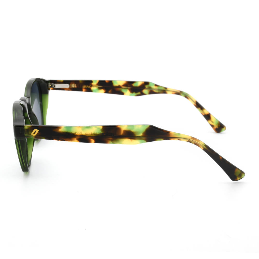 Sunglasses with green tortoiseshell frame on a white background